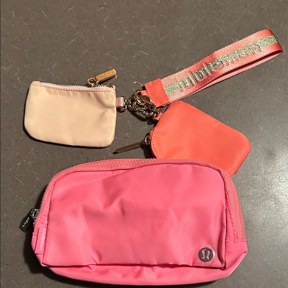 Lululemon Pink and Orange Clutch Set